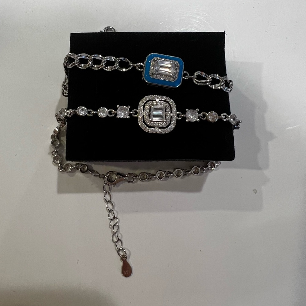 2 sterling silver and cz bracletes